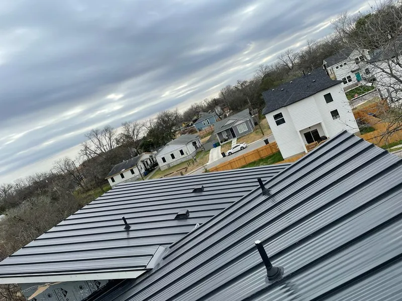 Standing seam metal roof panels with vents for Skylight Repair in Juneau